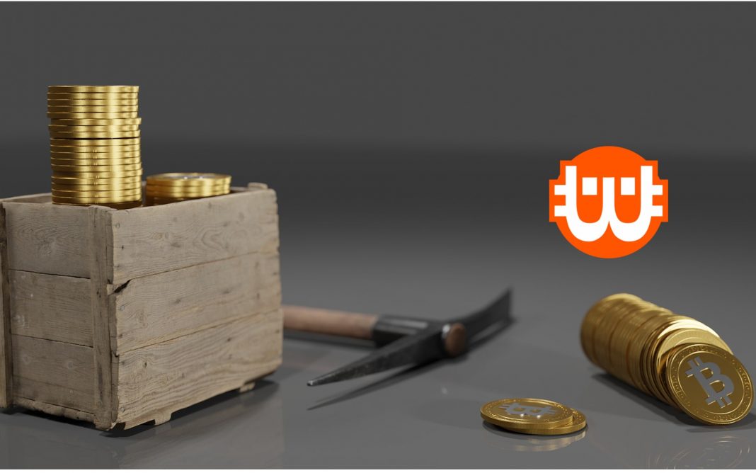 bitcoin és egy bányász csákány